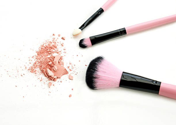 istock cosmetic brush and powder isolated on white 517537110