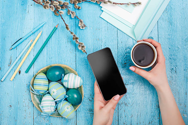 istock The top view of easter on wooden table office workplace 517537602
