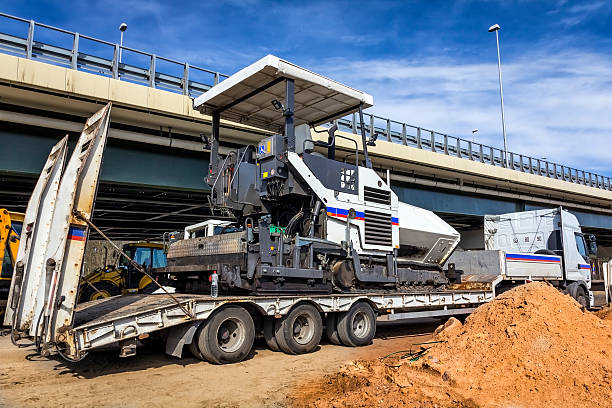 istock The trailer platform with Asphalt paving machine 517538048