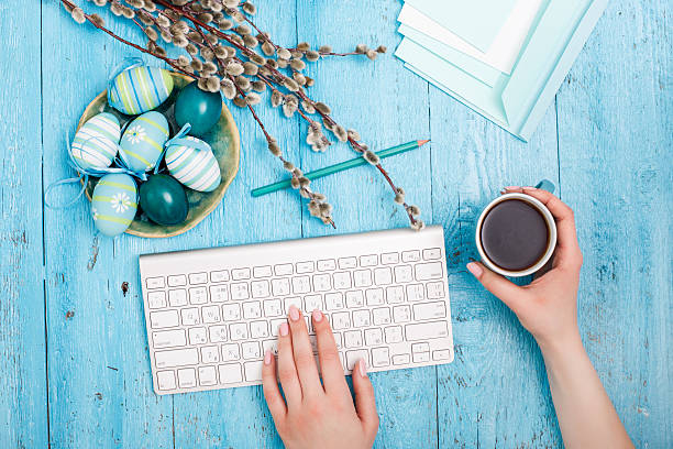 istock The top view of easter on wooden table office workplace 517538264