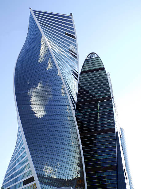 istock skyscrapers on background of blue sky 517541712