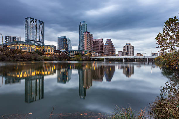 istock Austin downtown skyline by the river at night, Texas 517542910