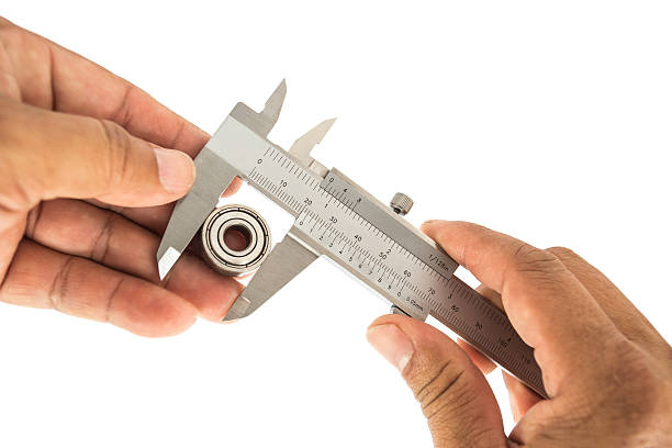 istock Measuring bearing by vernier caliper 517544274