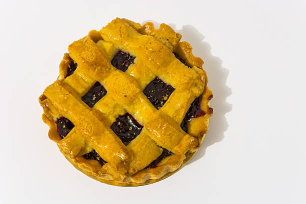 istock Cherry pie, cake seen from above on a white background 517544798