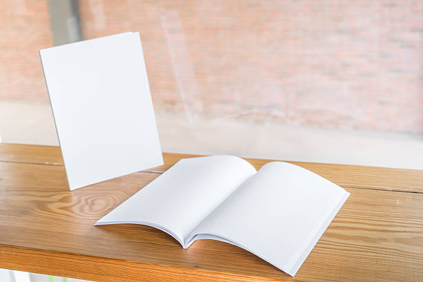 istock Blank catalog, magazines,book mock up on wood background 517545464