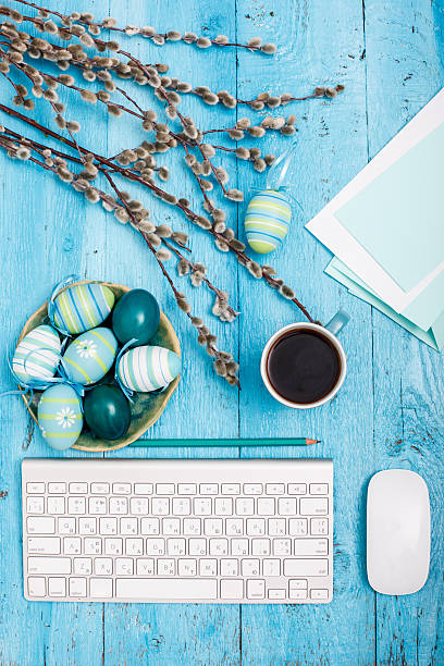 istock The top view of easter on wooden table office workplace 517545918