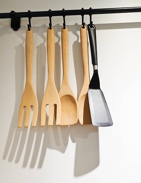 istock Set of Kitchen Spatula on The Wall 517546462
