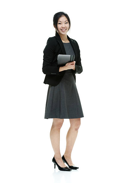 istock Smiling businesswoman holding tablet 517547220