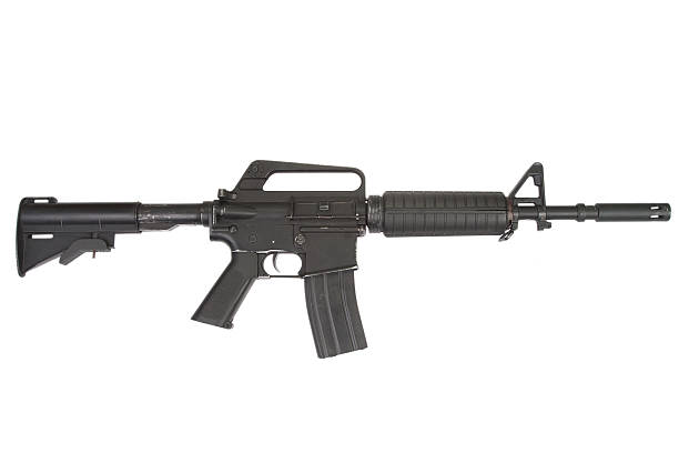 istock CAR-15 carbine isolated on a white background 517547529