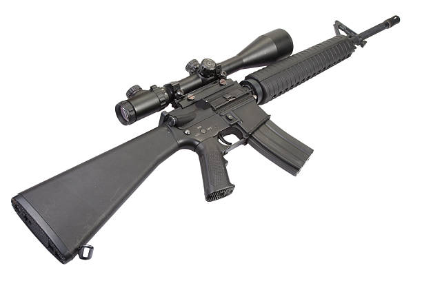 istock m16 rifle with telescopic sight isolated on a white background 517547531