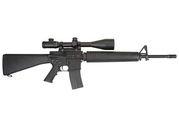 istock m16 rifle with telescopic sight isolated on a white background 517547545