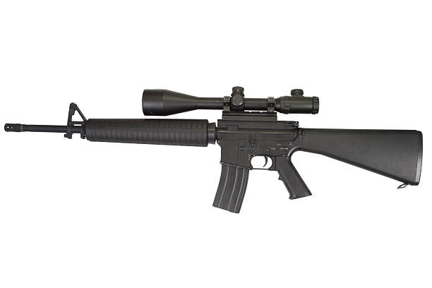 istock m16 rifle with telescopic sight isolated on a white background 517547547