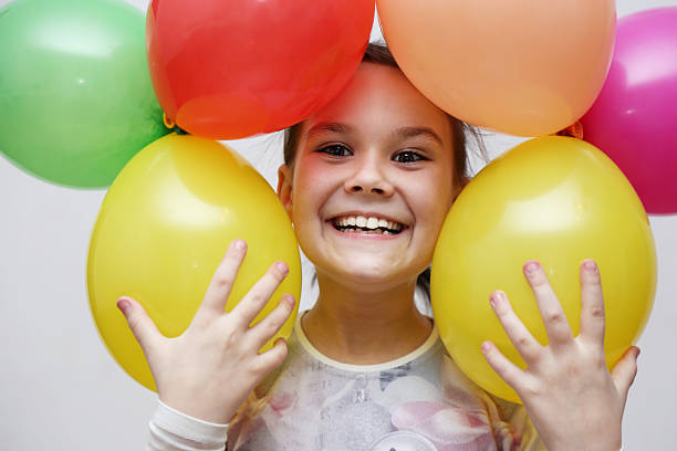 istock Cute girl celebrate her birthday 517547706