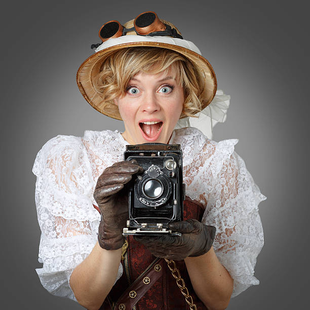 istock Beautiful happy woman with retro camera. 517549023