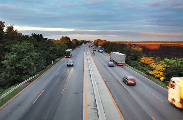 istock Higway road with cars 517549025