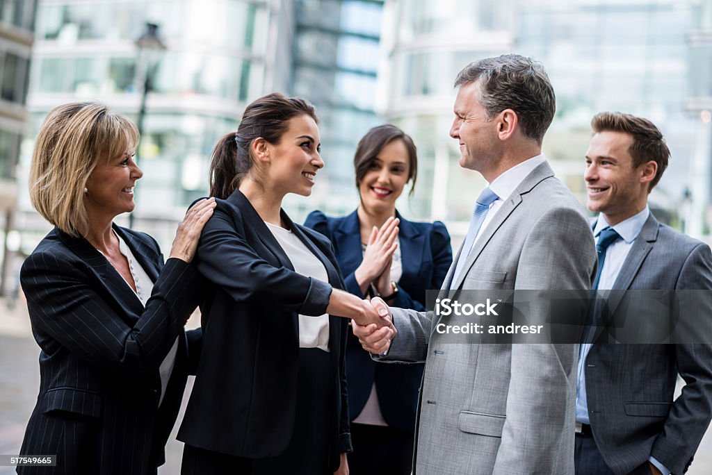 Business handshake Business handshake of people closing a deal Adult Stock Photo