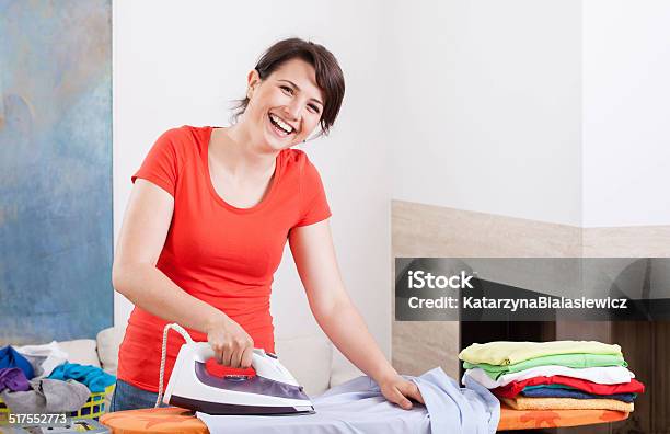 Smiling Woman Ironing Clothes Stock Photo - Download Image Now - Adult, Adults Only, Basket