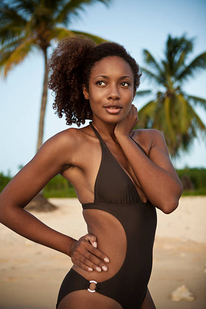 istock Latin beauty at the beach 517552961