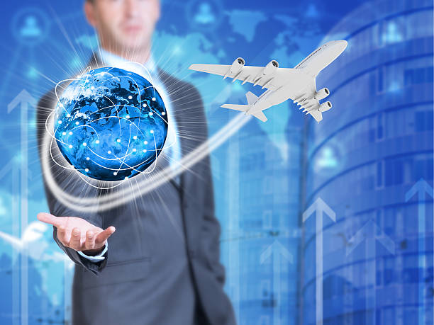 istock Businessman holding earth. Buildings as backdrop 517553097