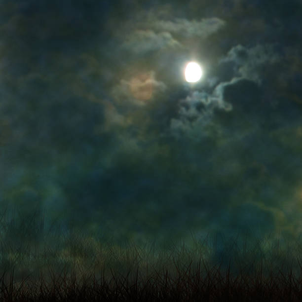 istock Spooky Halloween graveyard with dark clouds and ominous moon 517553667