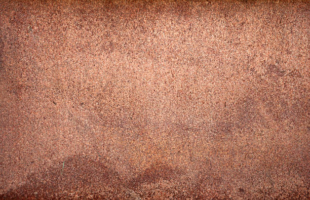 istock Texture of wall polished pink granite 517554625