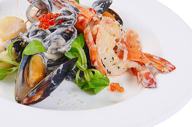istock The black spaghetti with seafood closeup 517568506