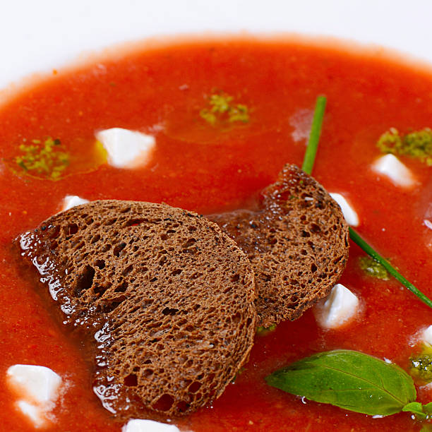 istock Soup from baked tomatoes with pesto 517568612