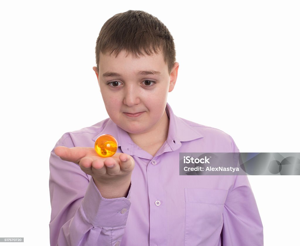 Fat Kid Holding A Glass Ball Stock Photo Download Image Now Studio fat-kid-holding-a-glass-ball-stock-photo-download-image-now-studio