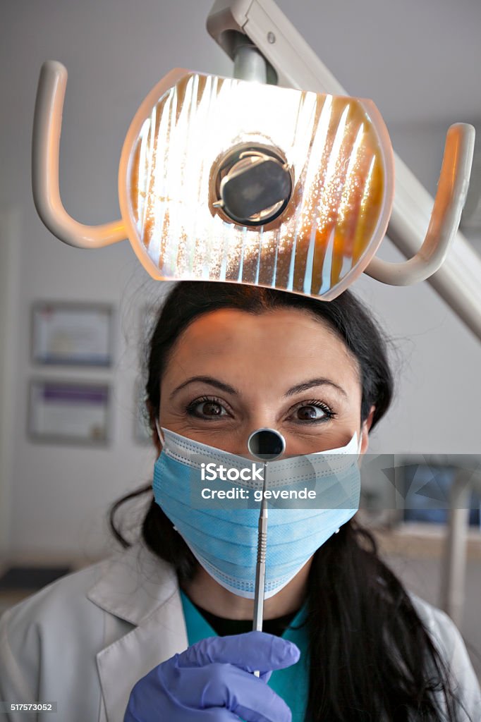 Doctor dentist smiling Dental Hygienist Stock Photo