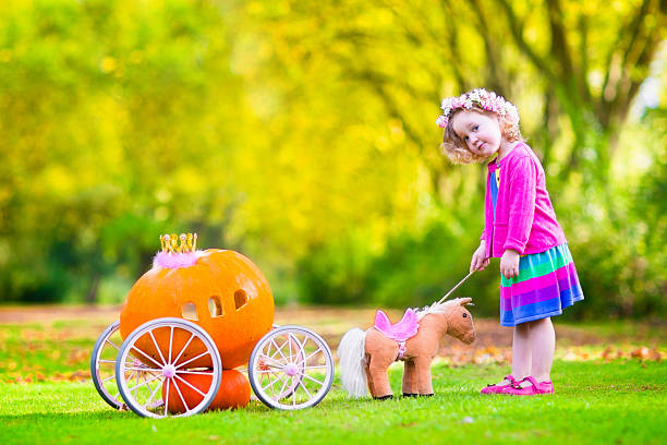 istock Beautiful little girl playing Cinderella 517574849
