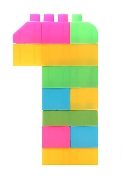 istock Colorful plastic blocks forming the number one. 517575911