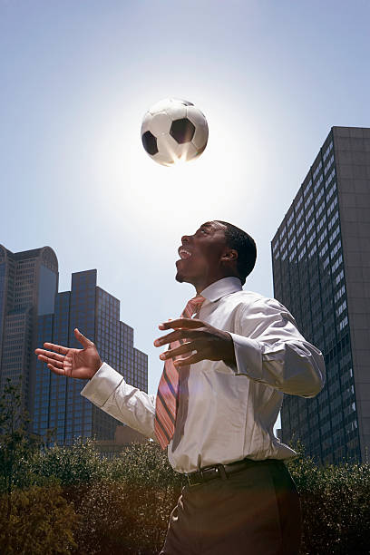 Businessman with a soccer ball