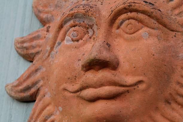 istock Terracotta Sun garden ornament 517576488
