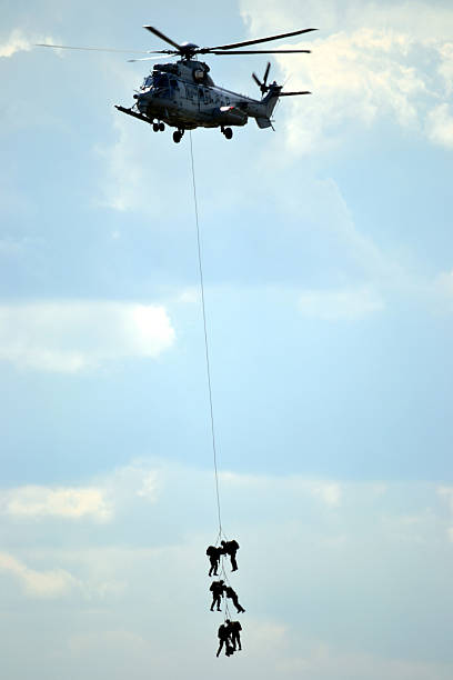 helicopter flying over the ocean