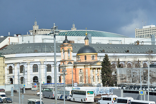 Moscow, Russia, March, 20, 2016. St. Barbara Church on the background of Gostiny Dvor in Moscow