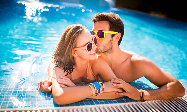 istock Guy Kisses Girl on Cheek 517579043