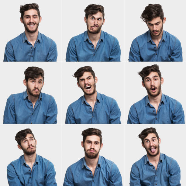 istock Young man making facial expressions 517579392