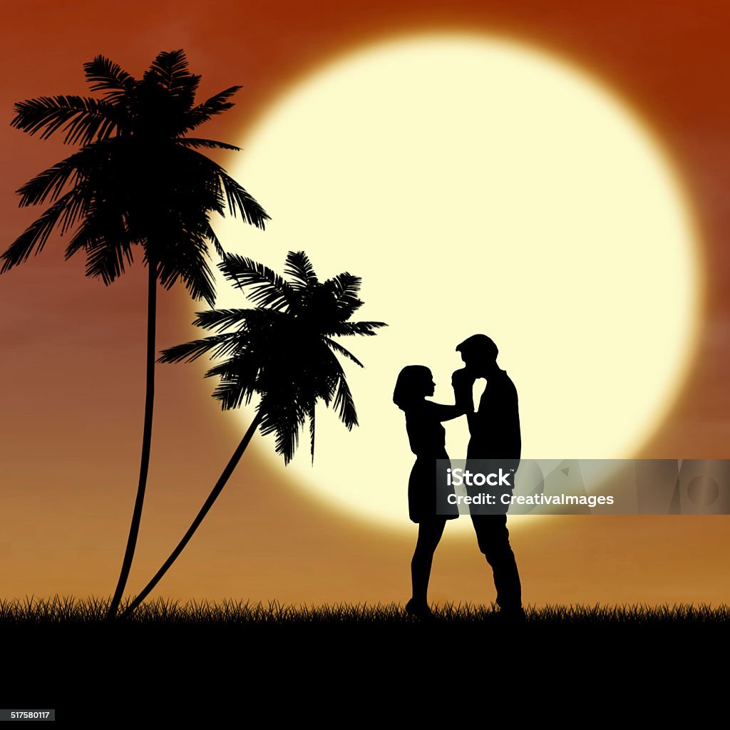 Girl and guy in love by sunset silhouette A guy is kissing her girlfriend's hand at sunset on the beach Adult Stock Photo