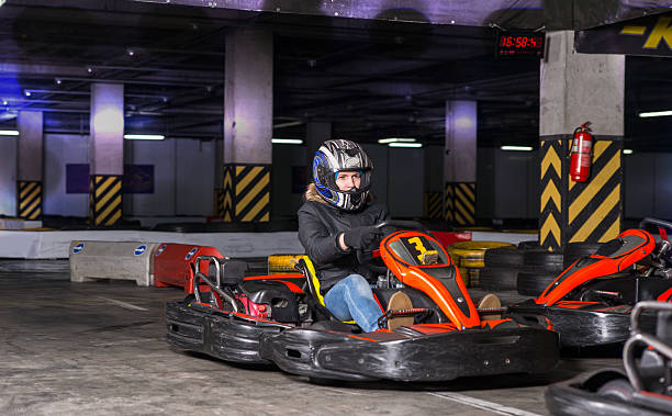 istock Woman driving a bumper car 517580240