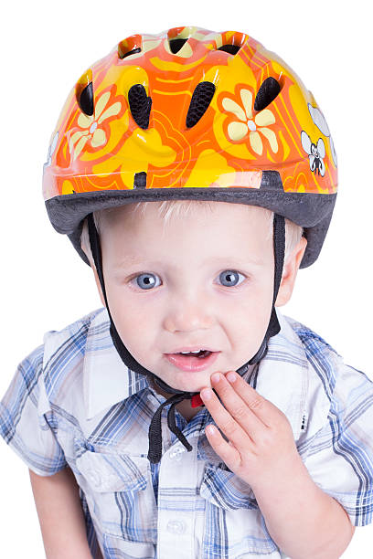 istock Young boy with cycling helmet 517580956