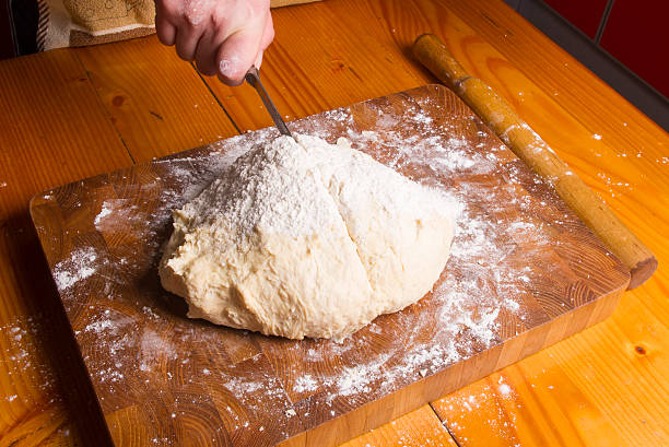 istock dough on a wooden Board 517581850