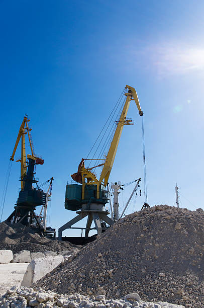istock harbour cranes on loading in sea port 517582864