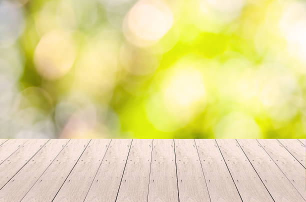 istock Wood Plank with Bokeh Background 517583322