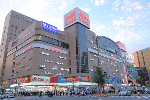 Tokyo, Japan - September 4, 2022 : People at Shinjuku in Tokyo, Japan. Shinjuku is a major commercial and entertainment district in Tokyo.