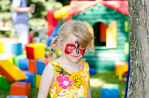 istock child with face painting 517596081