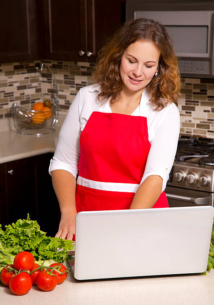 istock woman in the kitchen 517598079