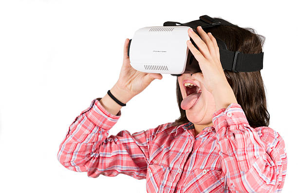 istock Girl with virtual reality glasses 517598896