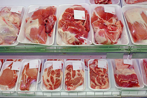 istock Packaged meat  on supermarket shelves 517600787