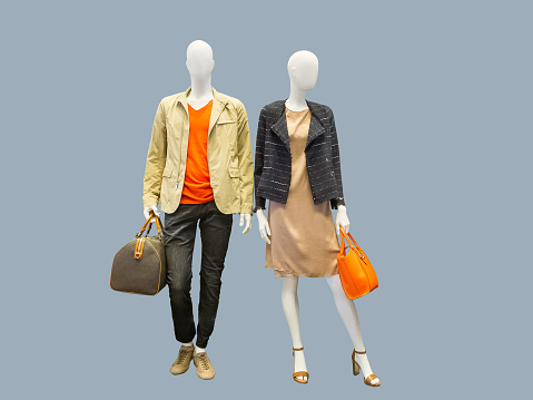Two mannequins dressed in casual clothes
