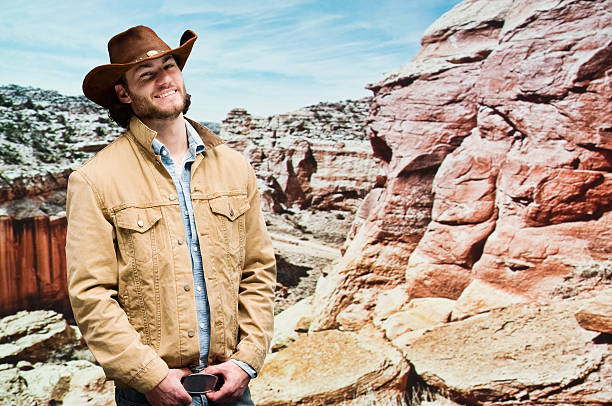 istock Smiling cowboy at the mountain 517608348